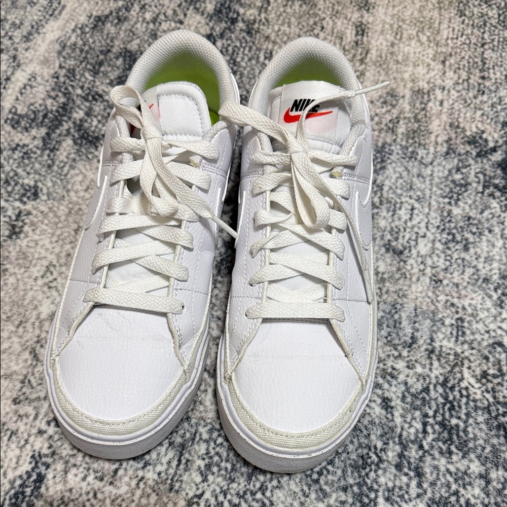 Nike White Low-Top Sneakers with Red Swoosh and Lime Inner Lining